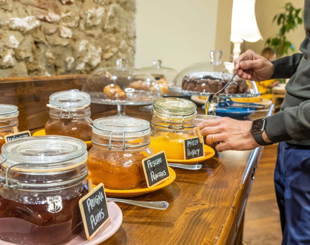 breakfast buffet with organic jams and homemade cakes at agave in città livorno