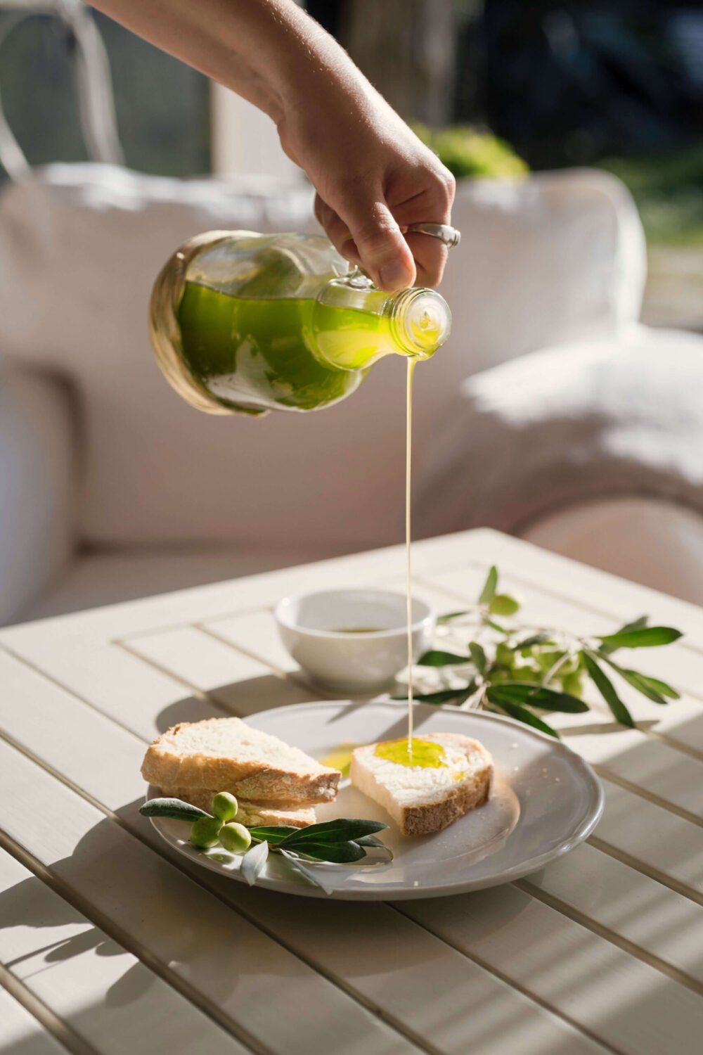 green organic olive oil on cured on a bruschetta at podere l'agave San Vincenzo