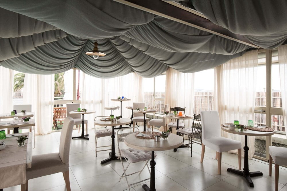 table setting for breakfast in a summer house in san vincenzo