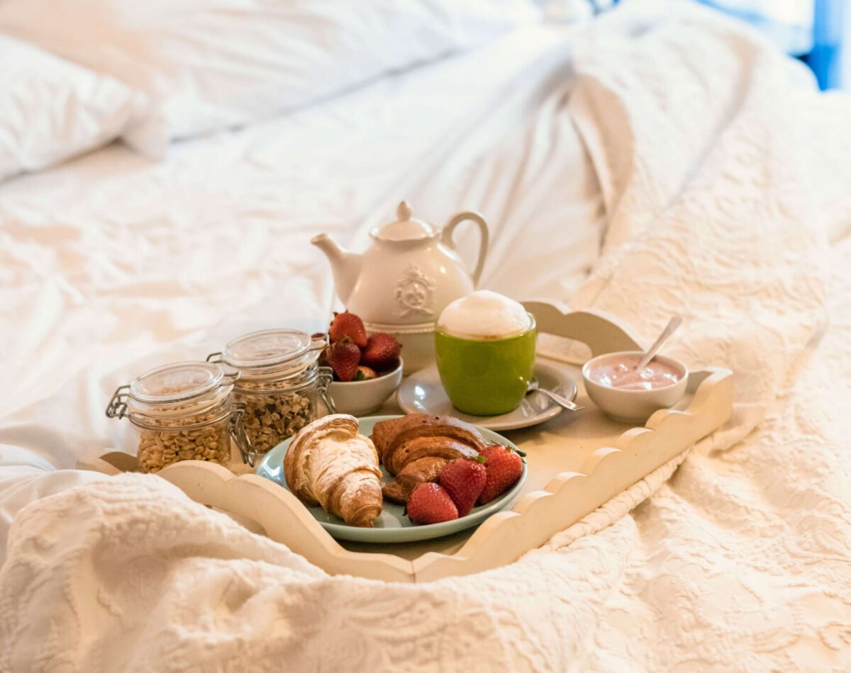breakfast room service with cappuccino and fruits in san vincenzo