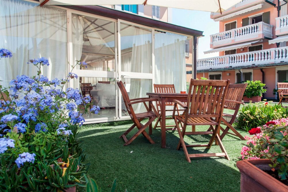 hotel with private garden and table