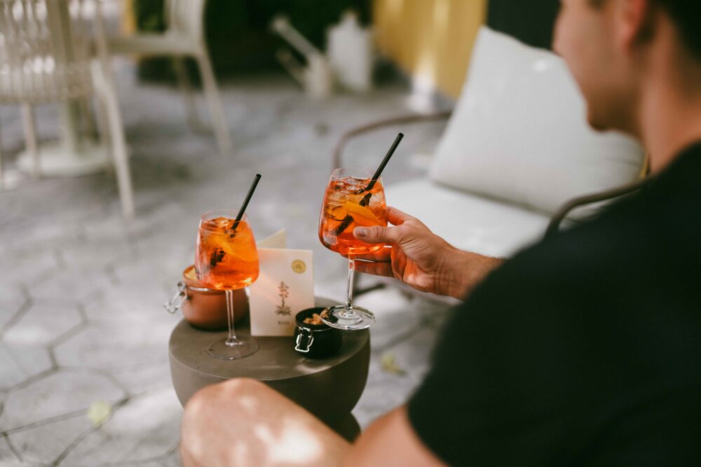 aperitivo in the silent green courtyard in milano