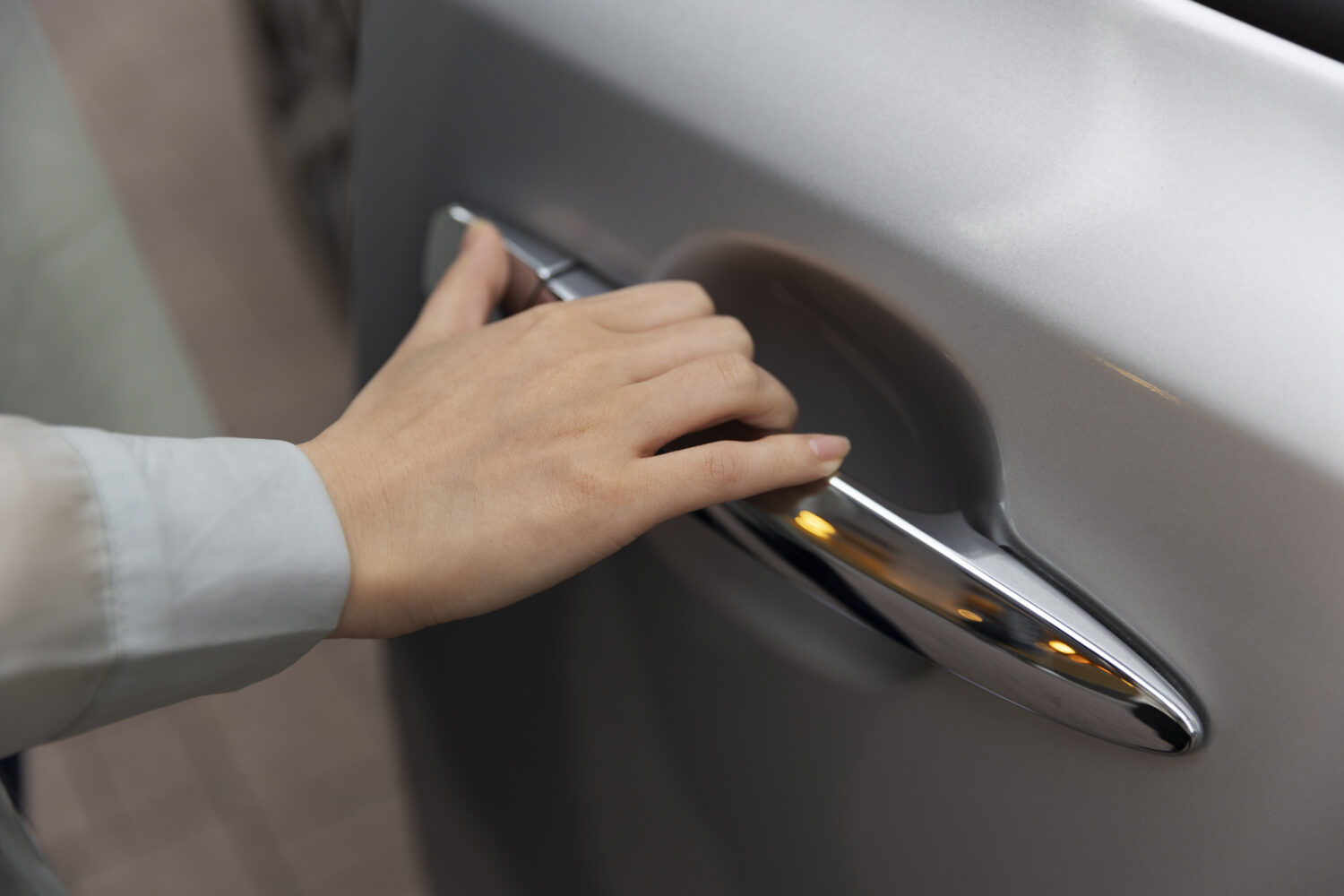 girl opening her car in a private parking in Agave in città Livorno